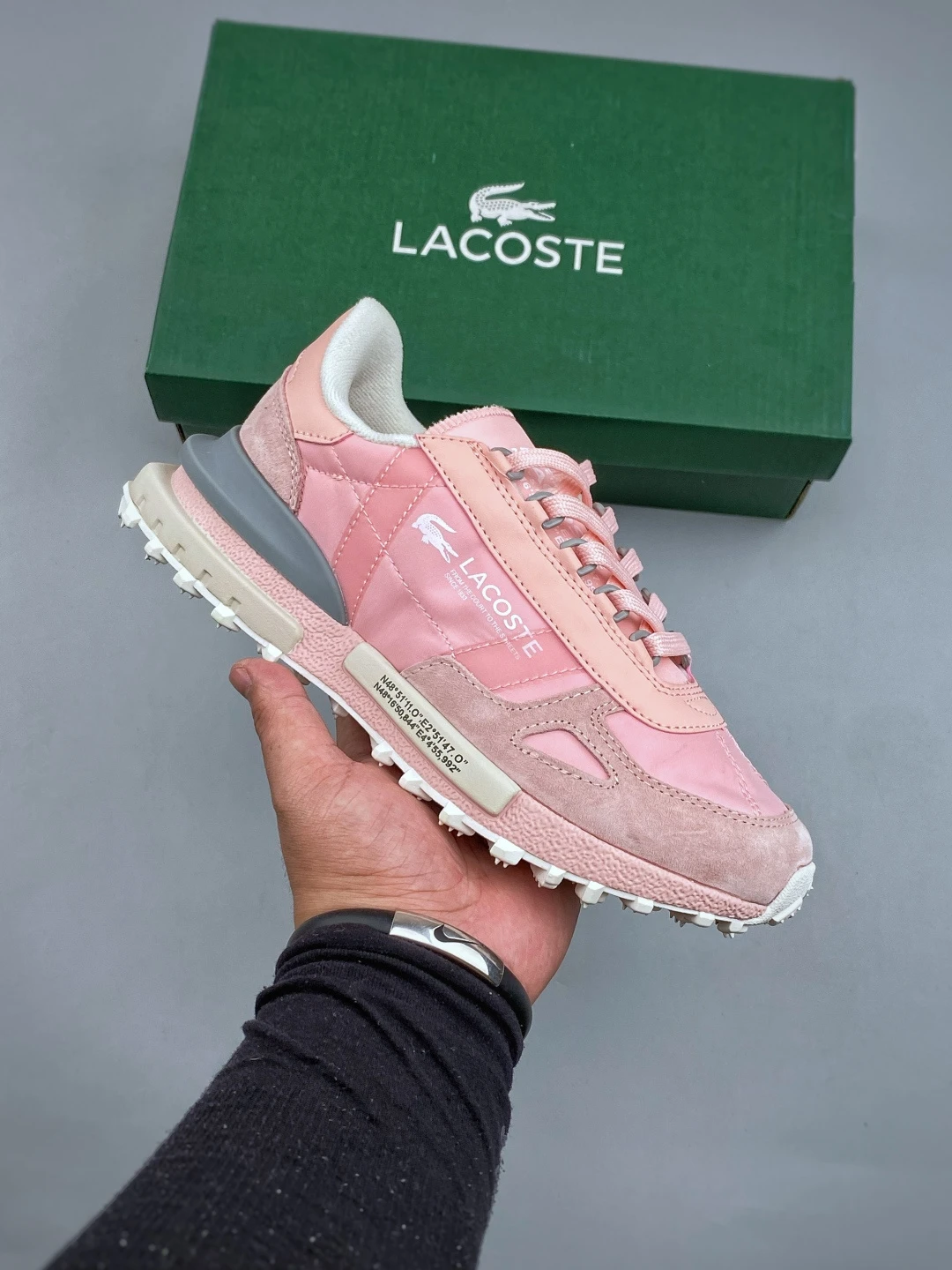Lacoste Elite Active Sneakers featuring a nylon upper, suede overlays, and a retro 70s-inspired rubber outsole