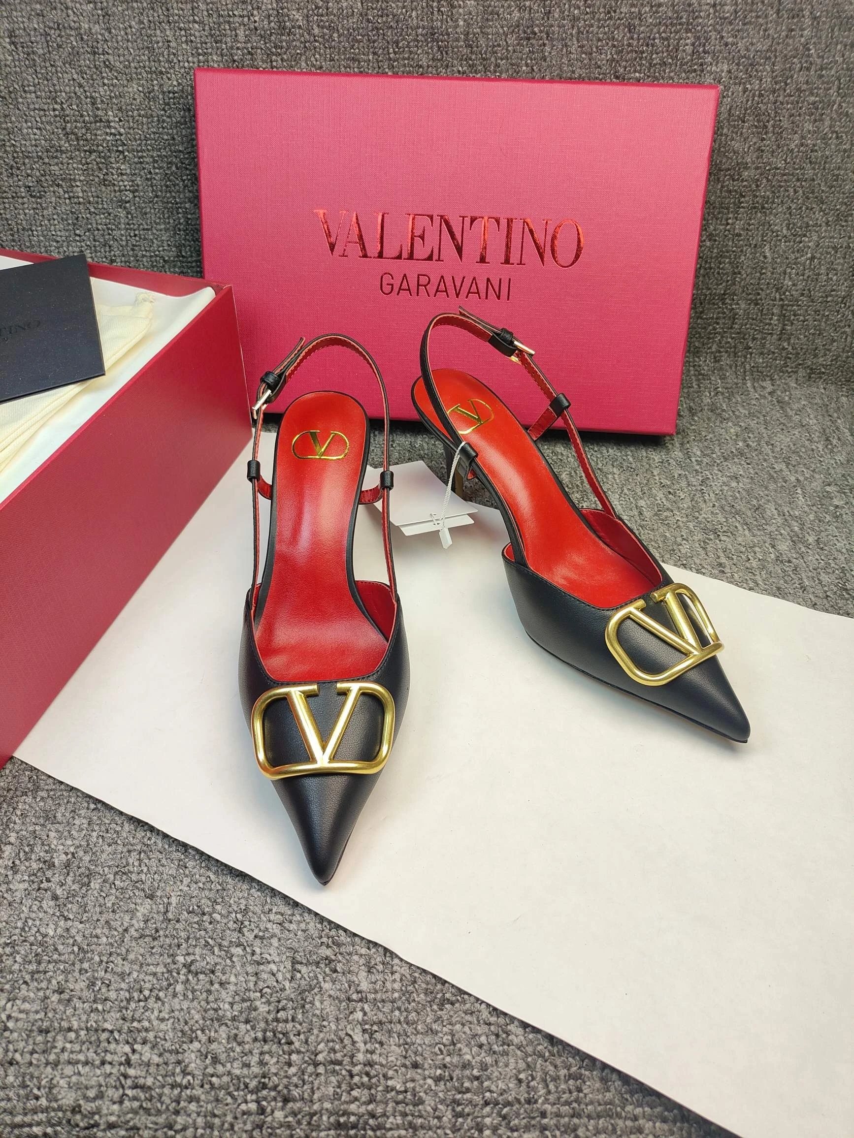Valentino Garavani VLogo Signature Calfskin Slingback Pump.
